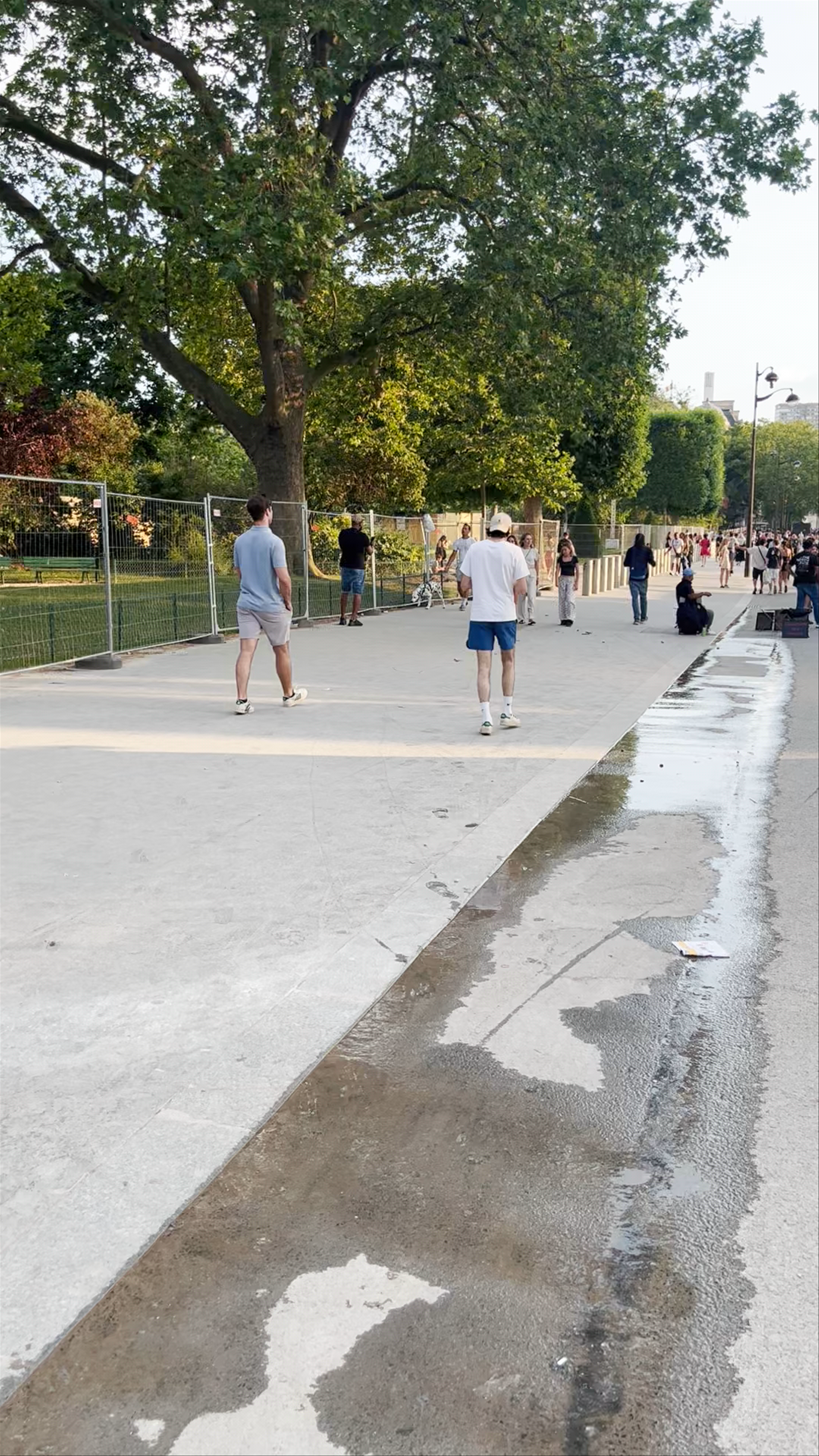 Evening Stroll by the Eiffel Tower Gardens, Paris