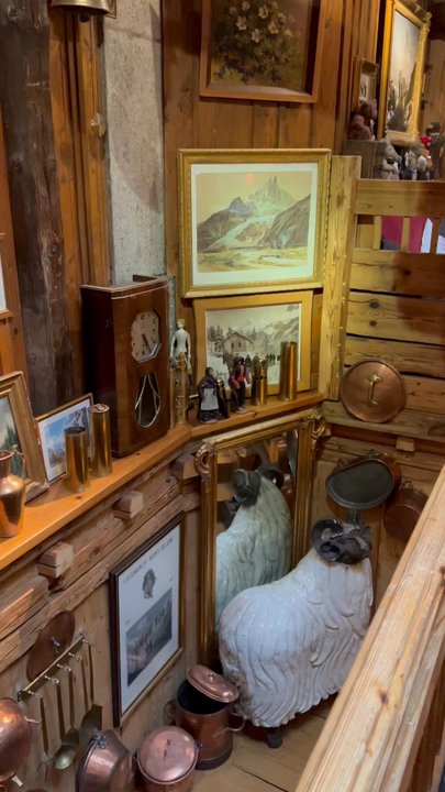 La Calèche - Idea from inside, there is interesting pictures and collections all through the store. - Fondue Near Me - Chamonix, 74