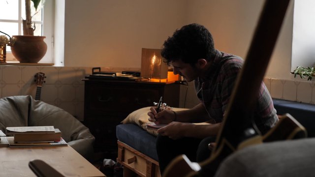Writing song lyrics down and then throwing them away