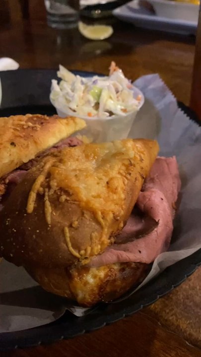 O'Keefe's Tavern - CHICAGO BEEF DIP *  Warm roasted Angus beef with provolone cheese on a toasted garlic parmesan roll served with au-jus - American Near Me - Clearwater, Florida