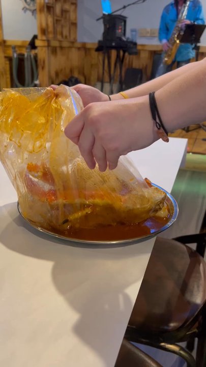 The Mighty Crab - The beauty of the "bag" display. - Seafood Near Me - Tyler, Texas