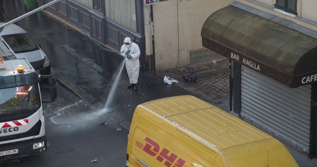 Cleaning a street in Paris
