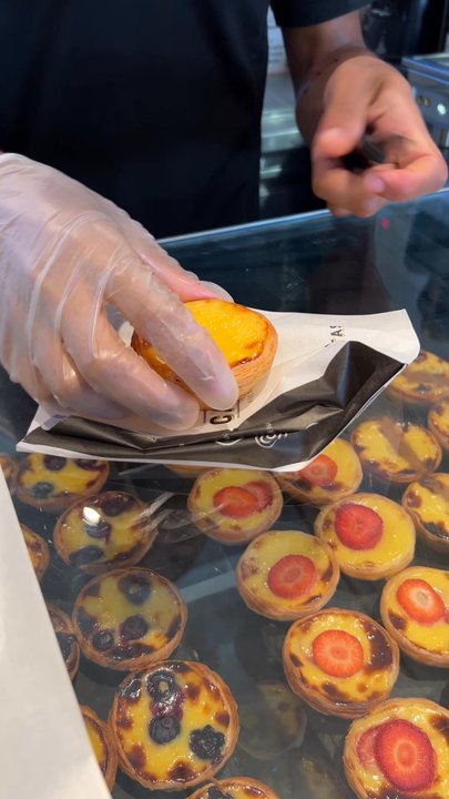 Cafe de Nata - Cutting an egg tart in half - Bakeries Near Me - London, XGL