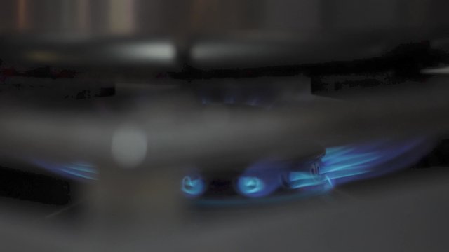 Close-up of lit stove 