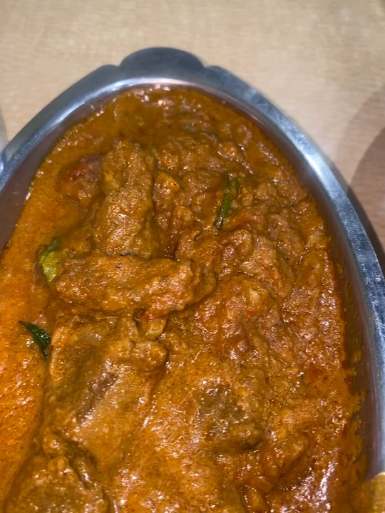 Vijaya Durga Indian Cafe - Andhra Goat Curry paired with white rice, Chicken Biryani  with a side of Garlic Garlic Naan - Indian Near Me - Plano, Texas