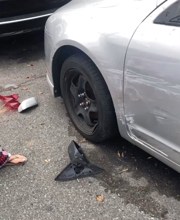 Bam's Autobody - This was my car after a drunk driver hit mine and my neighbors car. It was scrapped all along the sides. - Body Shops Near Me - Ozone Park, New York
