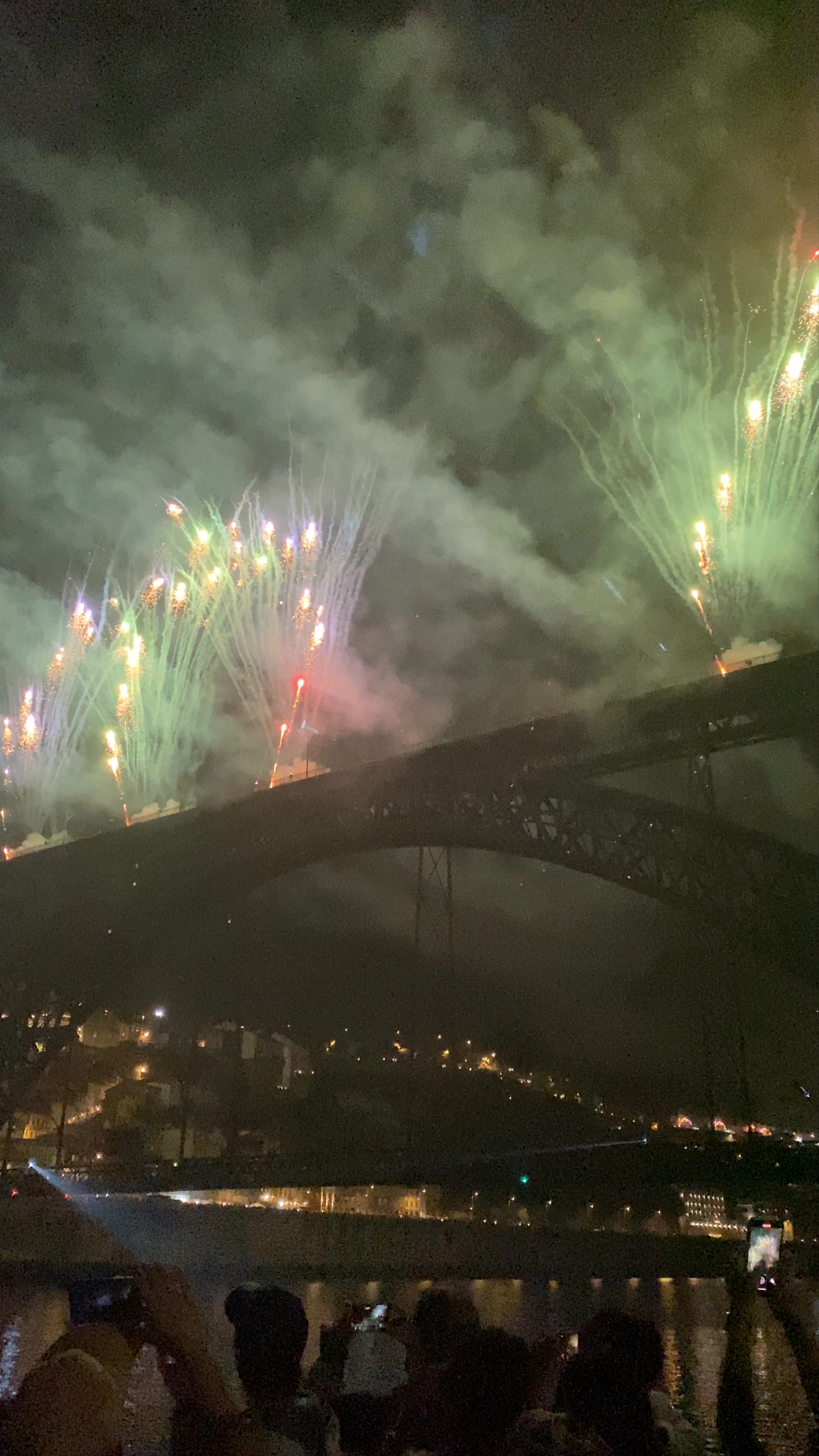 Vibrant Fireworks Festival Over Porto's Iconic Bridge at Night
