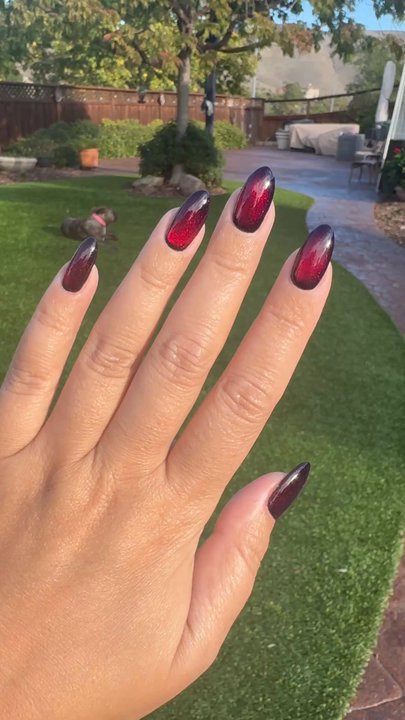 Nails by June - Gelx with black gel base and red cat eye - Nail Technicians Near Me - Pleasant Hill, California