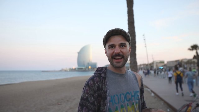 Man smiling on the beach