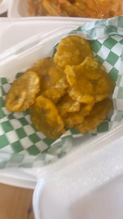 Los Dominiqueños - Tostones/Fried Plantains, Empanadas, Chuleta Frita/Fried Porkchops, and Yaroa Fries (Papas Locas) with Mayo Ketchup - Food Trucks Near Me - Saginaw, Texas