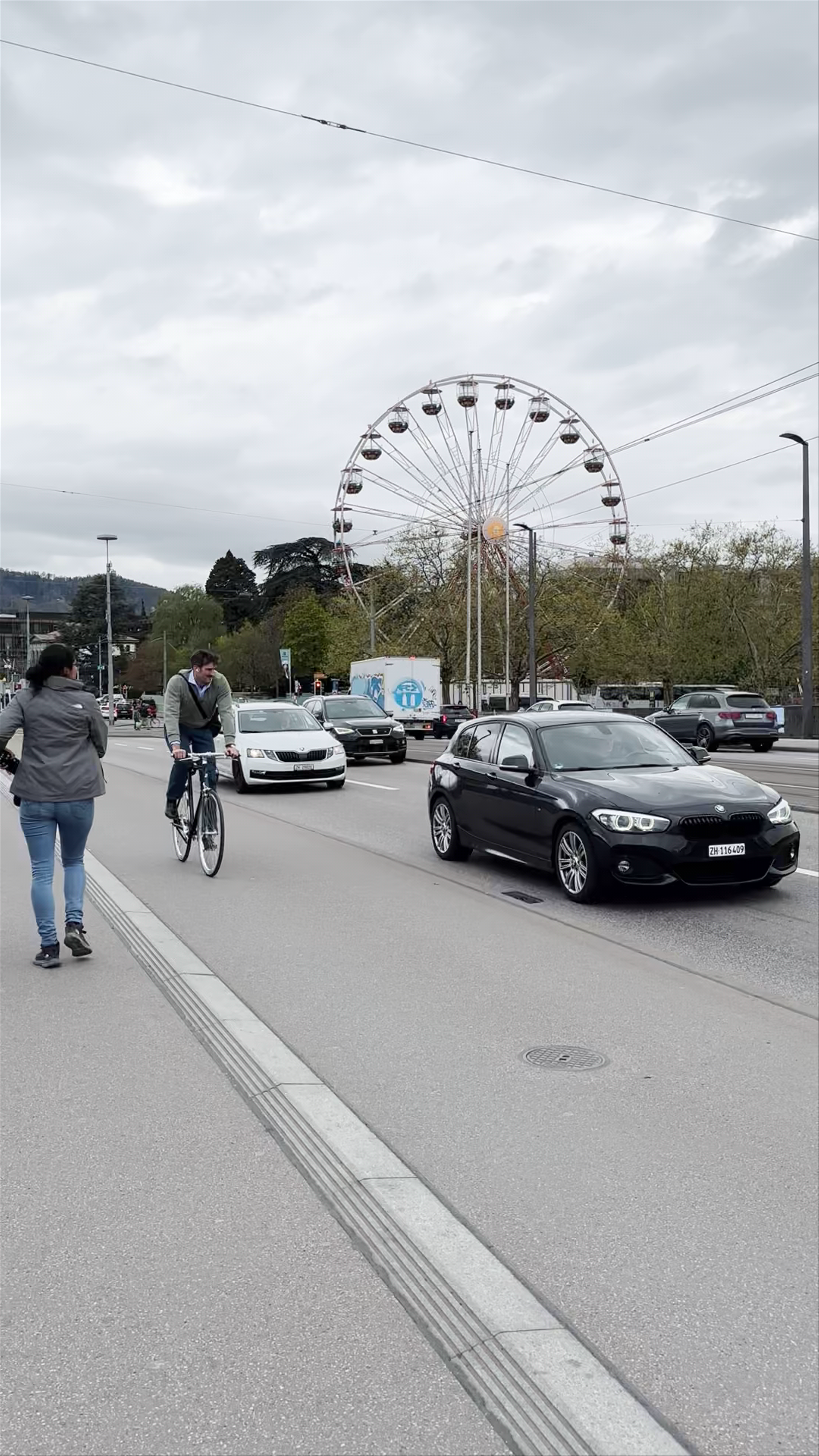 Quaibrücke in Zürich: A Walk by Lake Zurich with City Vibes and Ferris Wheel Views