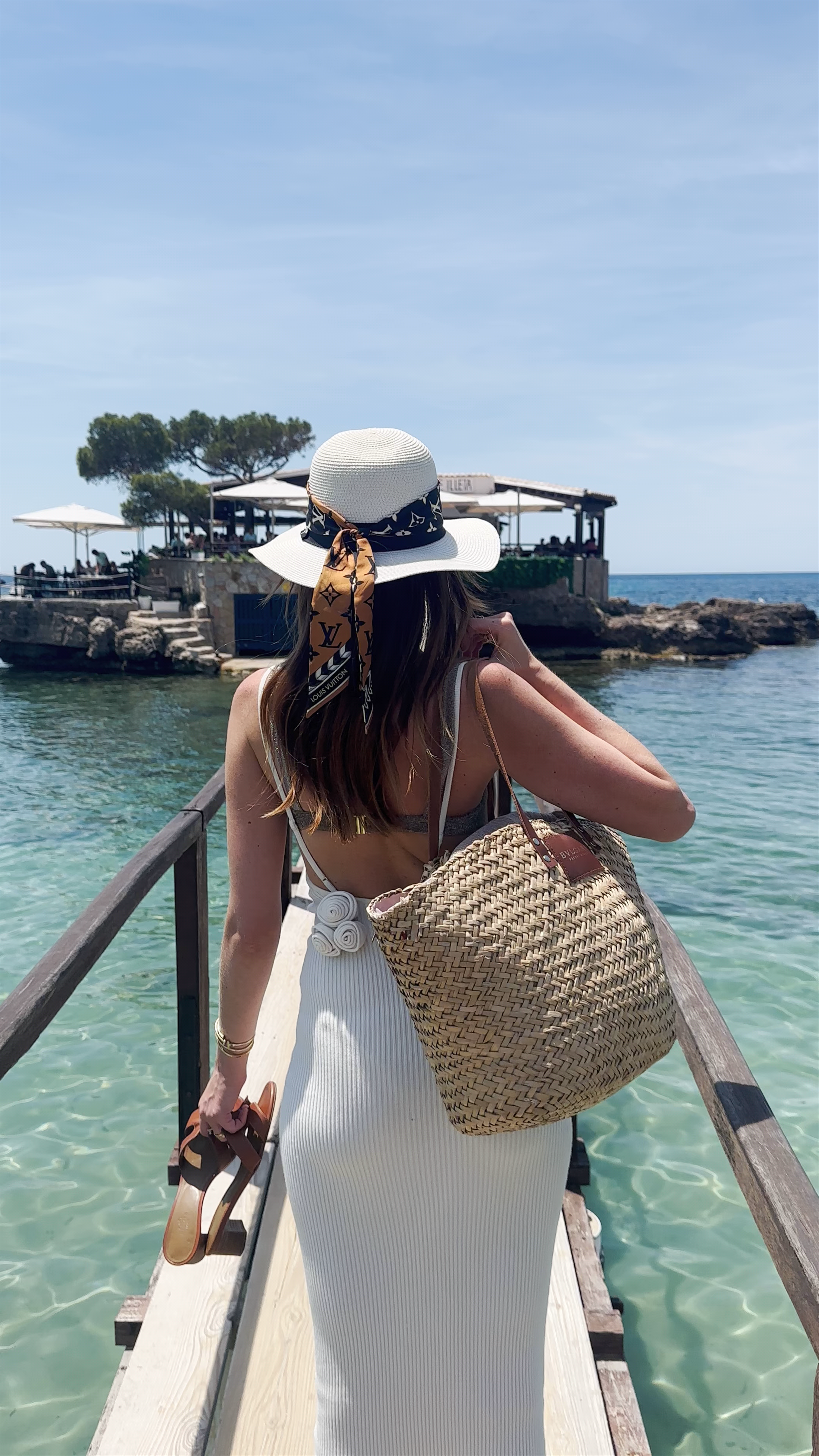Sunlit Stroll to Restaurant Illeta in Camp de Mar, Spain