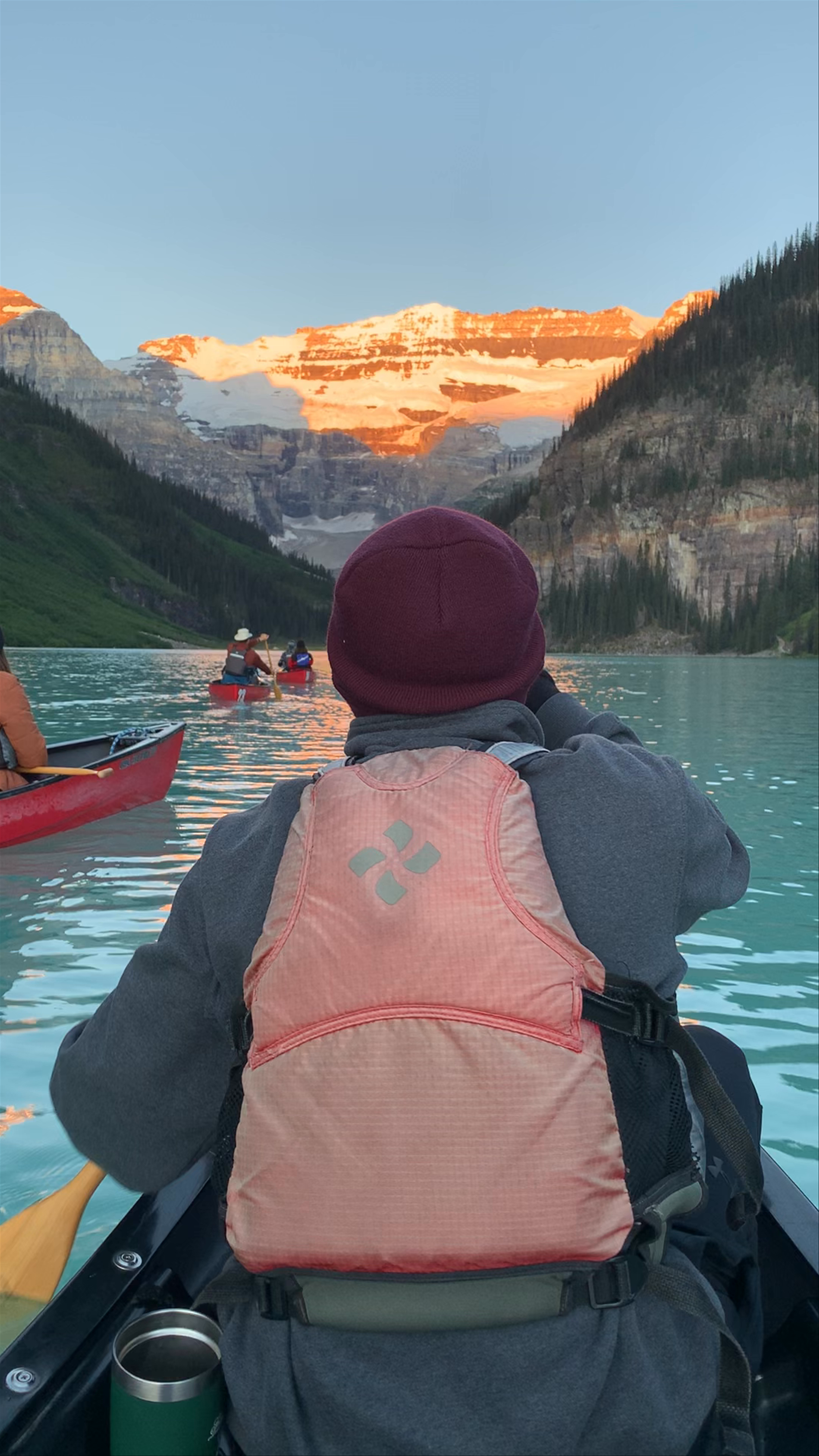Sunset Canoeing at Lake Louise with Majestic Mountain Views