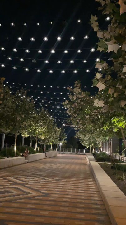 Insomnia Cookies - Sitting area on same side road by building. - Desserts Near Me - Austin, Texas