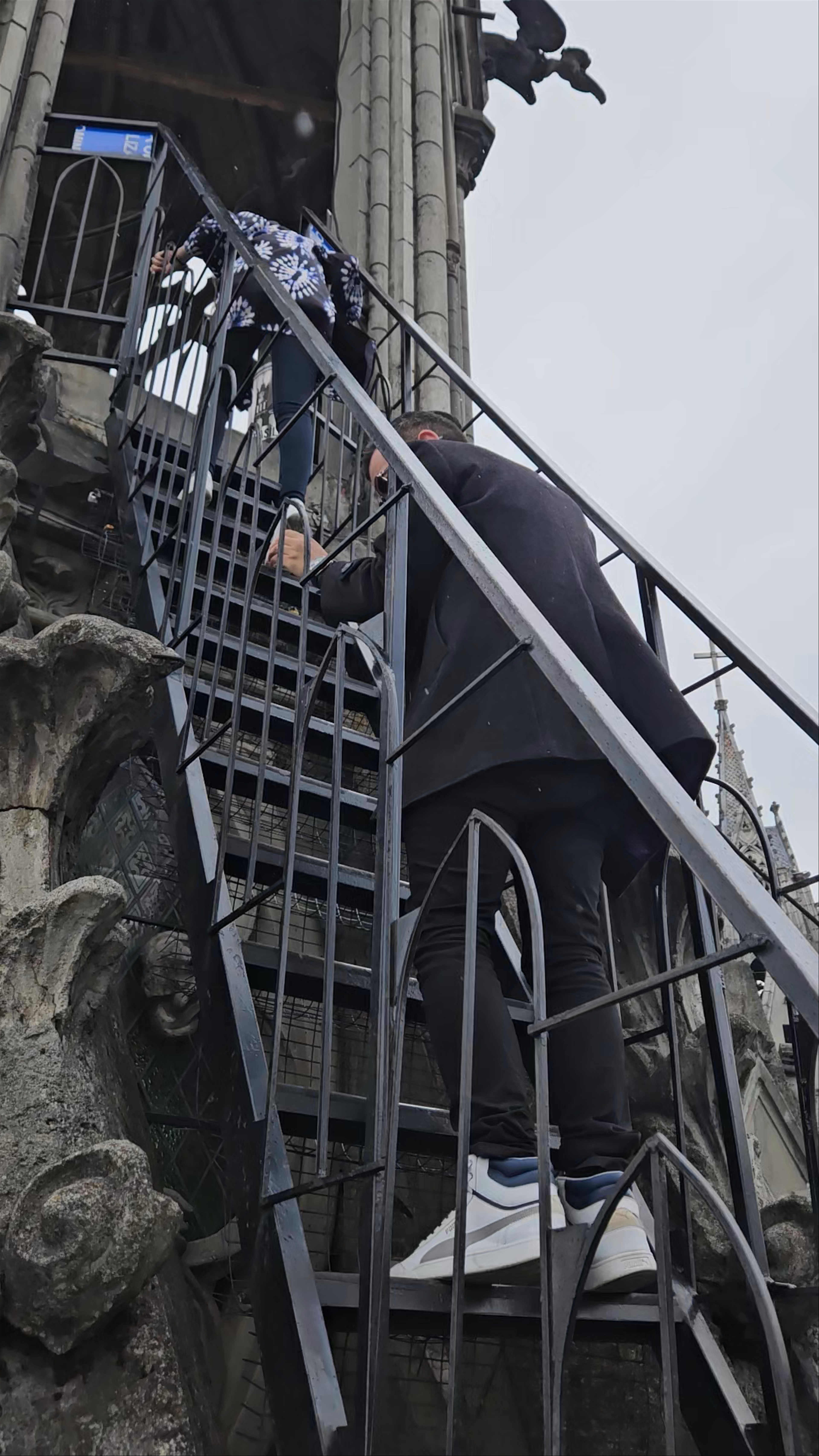Climbing Torre 1 de Basílica del Voto Nacional in Quito, Ecuador