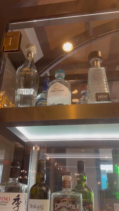 Holmes - Bottles on display.... - Southern Near Me - New Orleans, Louisiana