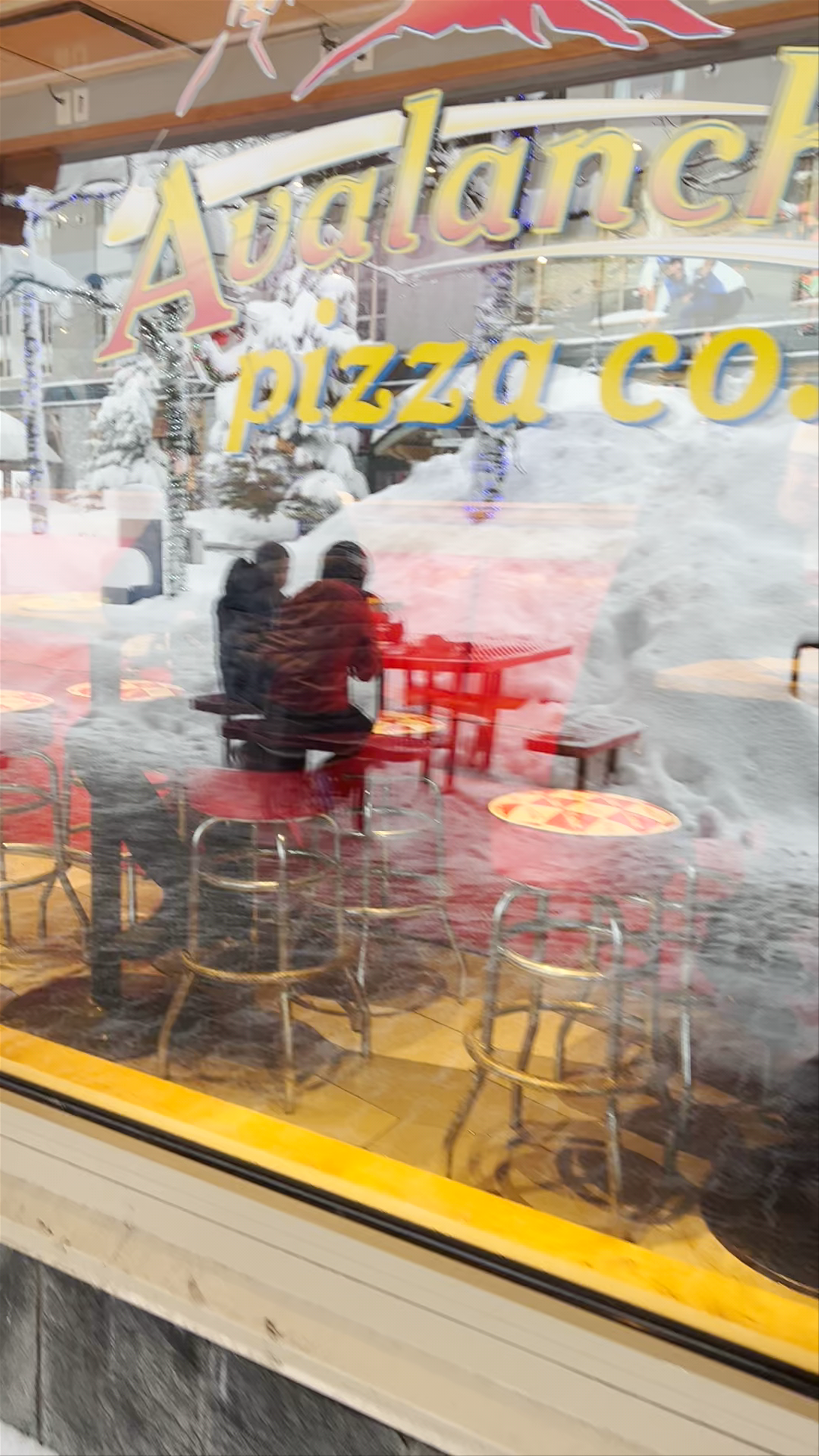 Avalanche Pizza in Wintery Whistler - Cozy Mountain Dining Experience