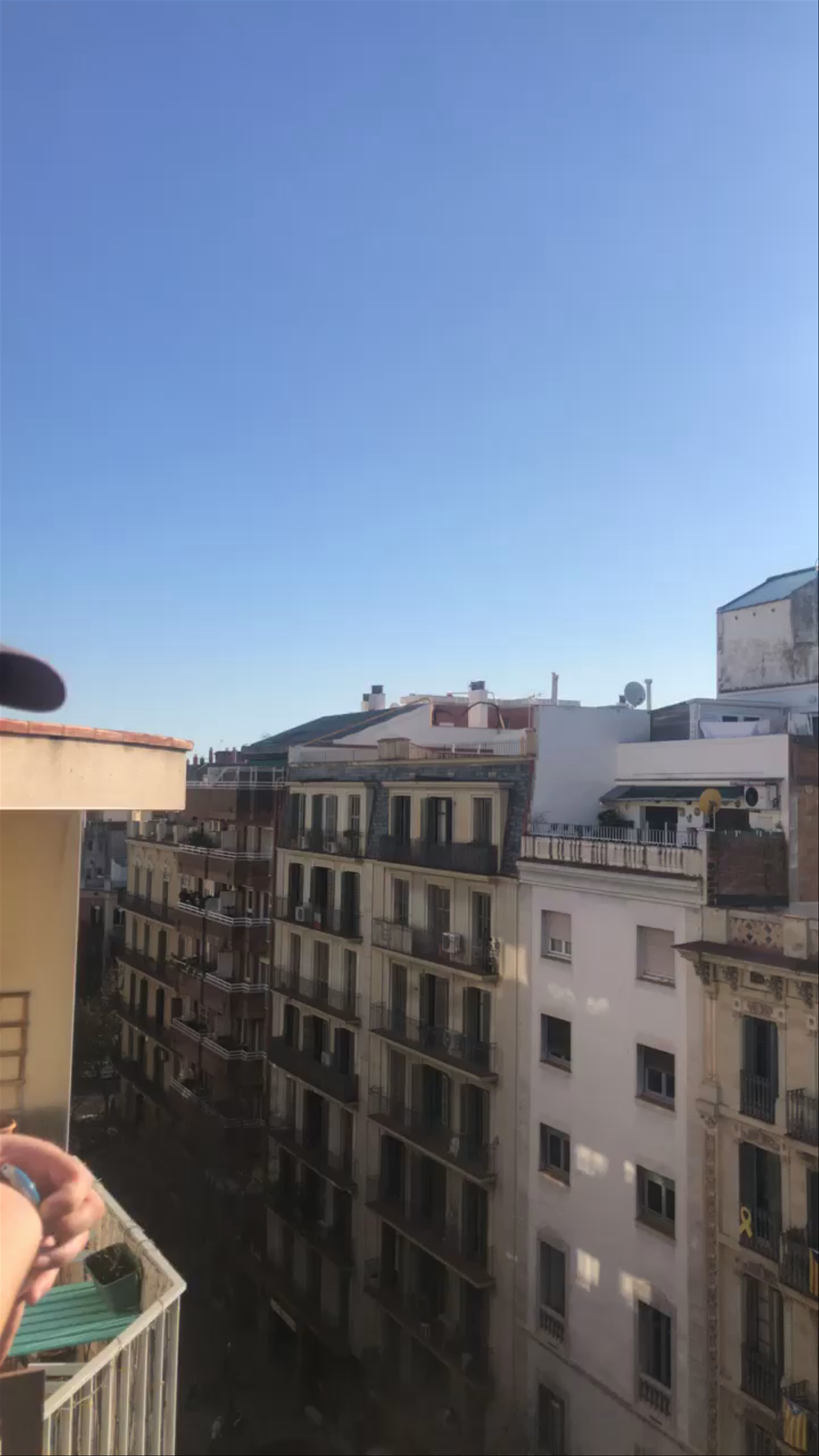Sunlit Urban Morning from Yeah Hostel Balcony, Barcelona