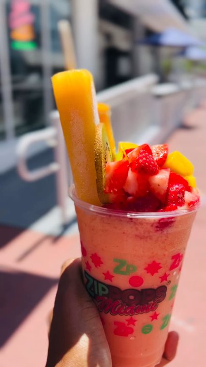 ZipPops - This was so good! Passionfruit popsicle, fresh mango, kiwi, strawberries and slice of orange on top of a smoothie. - Juice Bars & Smoothies Near Me - Miami Beach, Florida