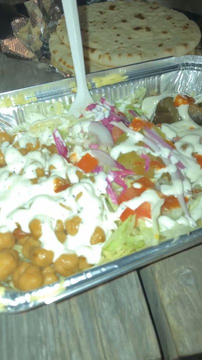 Weird Food - Chickpea and eggplant over rice! Sooo good - Food Trucks Near Me - Austin, Texas