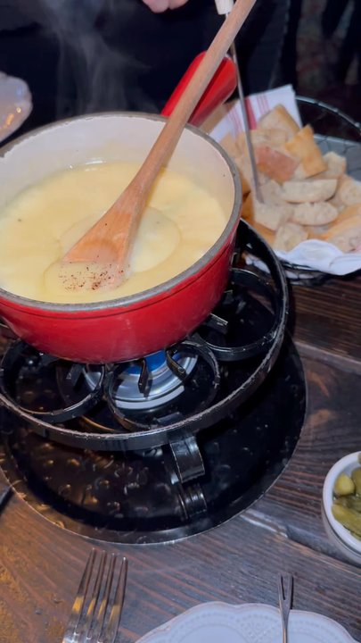 French Alpine Bistro - How creamy and delicious this fondue was! Comes with bread and we added Charcuterie & Cheese Boardterie - French Near Me - Aspen, Colorado