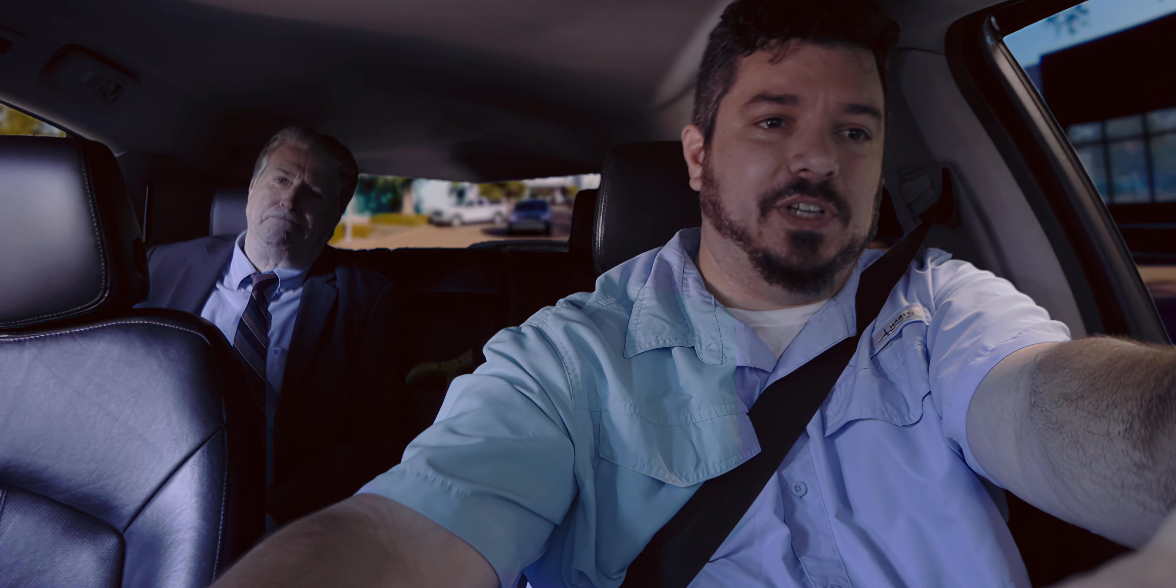 A rideshare driver engages in a conversation with a passenger in the backseat while navigating through an urban environment. The perspective shifts to an aerial view showcasing the city skyline.