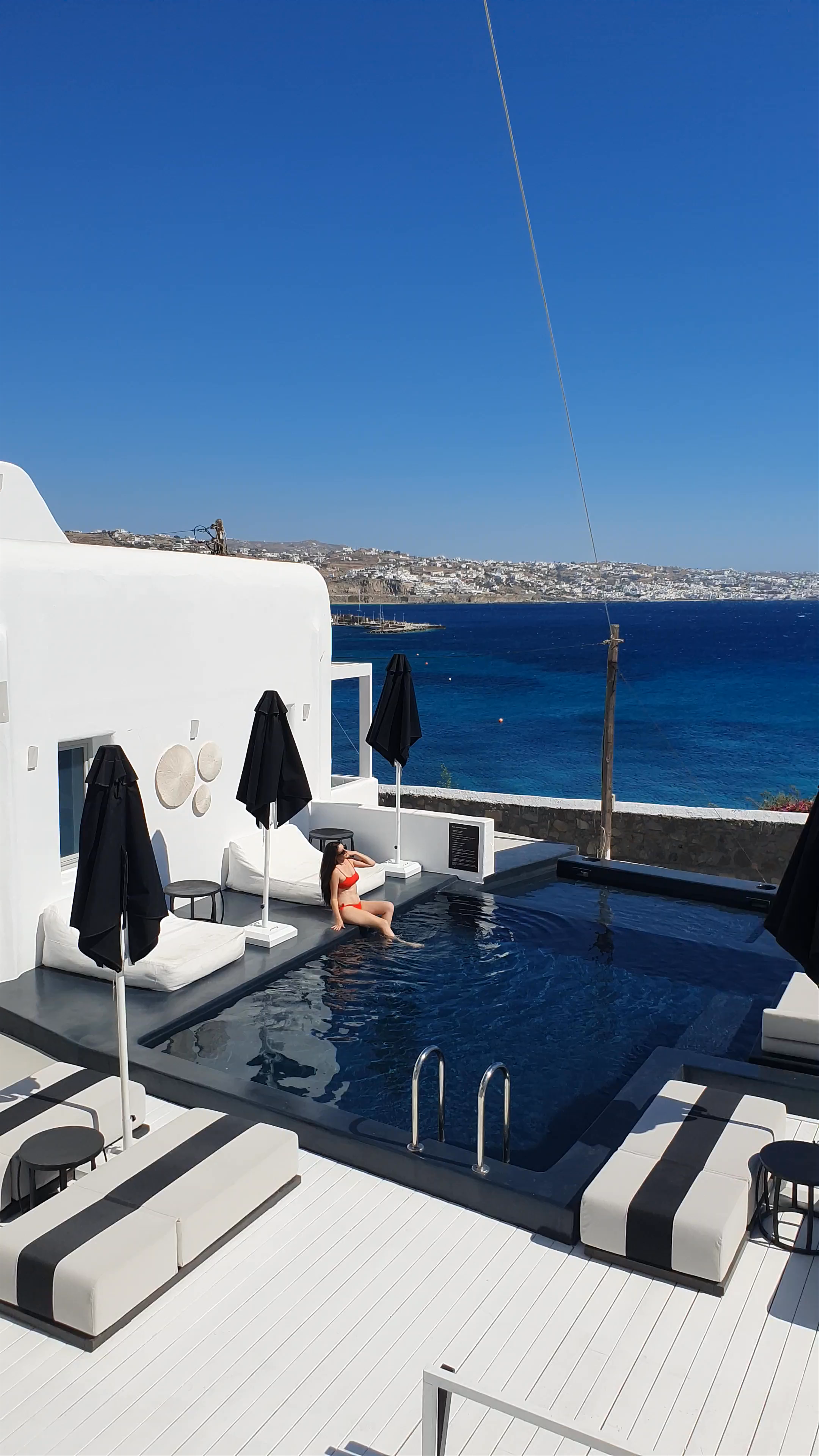Nimbus Mykonos: Luxurious Seaside Pool Escape in Agios Stefanos