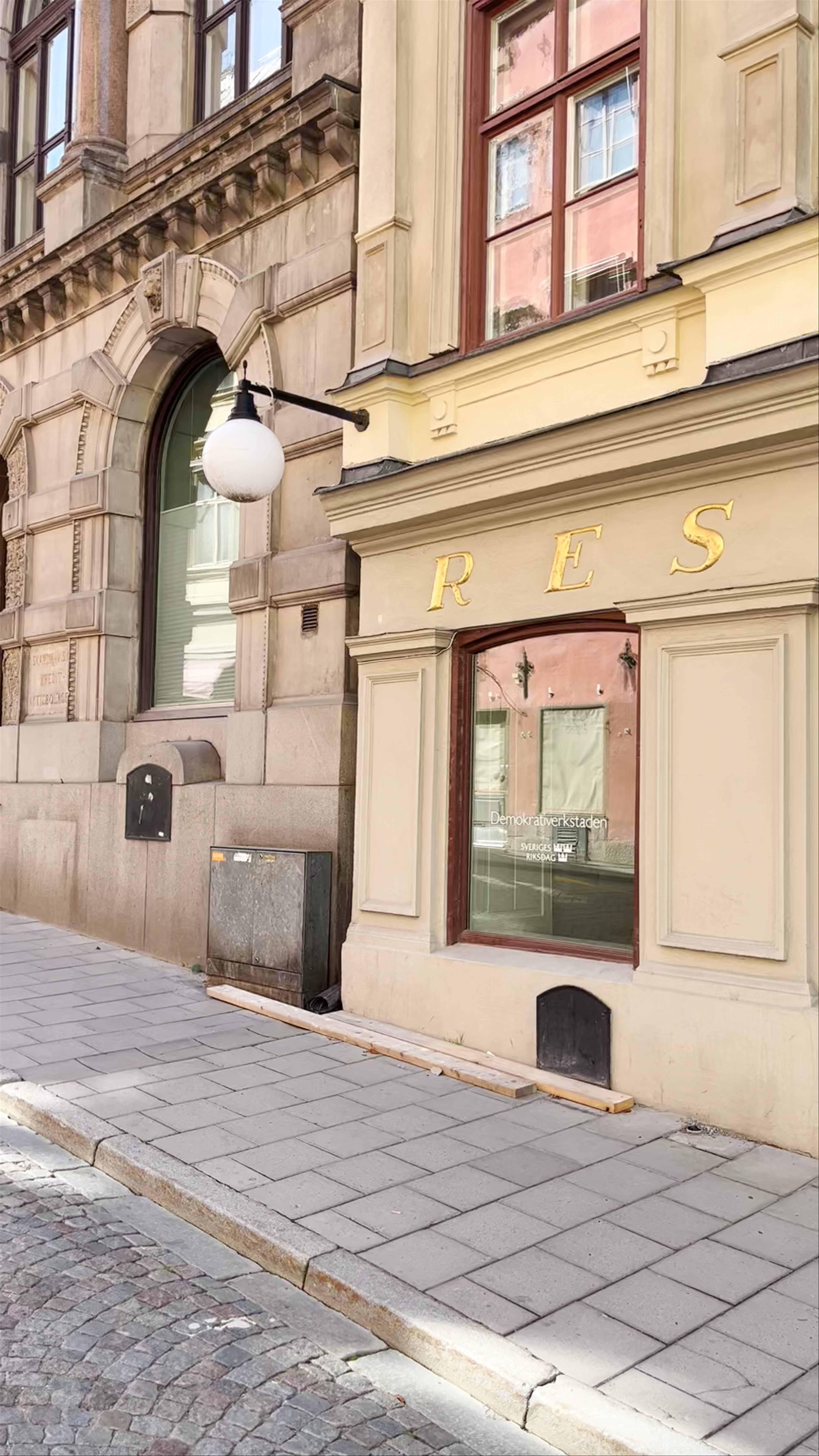 Sunlit Stroll Through Historic Streets of Stockholm