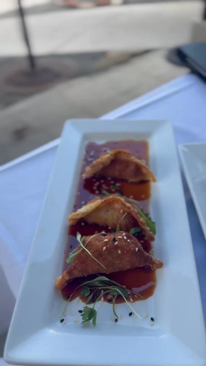 Santiago's Bodega - Chicken gyoza, chorizo potato fritters, white wine sangria! All happy hour specials, $7 tapas, and half price sangria! Such a great deal! - Tapas Bars Near Me - Key West, Florida