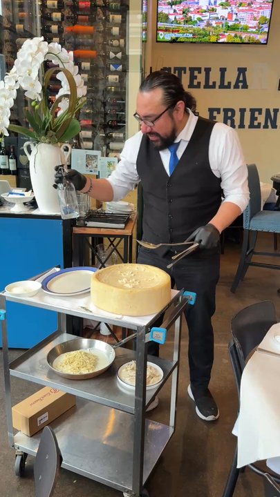 Stella Ristorante - This is the cheese wheel experience on video. It's trimmed, so 3 minutes becomes only the first 30 seconds - Italian Near Me - Southlake, Texas
