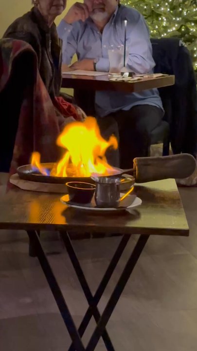 Tasha Lee’s Table - Flaming cheese appetizer - Steakhouses Near Me - Anacortes, Washington
