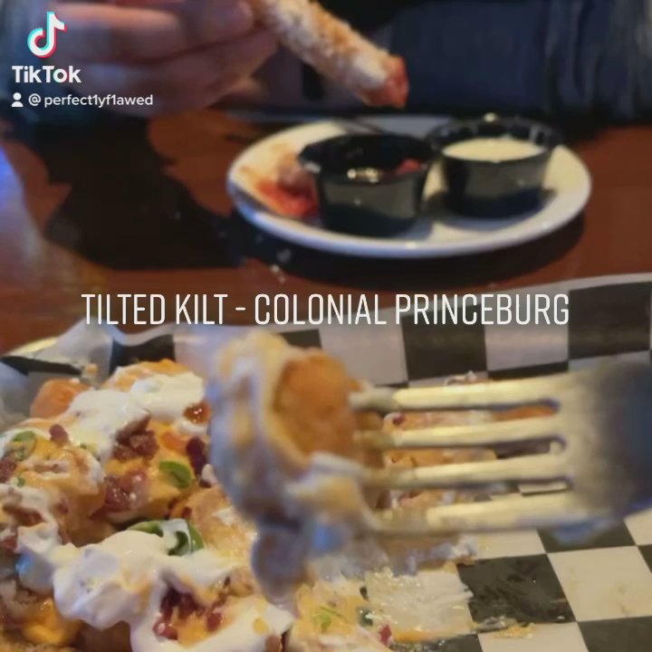 Tilted Kilt Pub & Eatery - Sharing a sampler platter - Pubs Near Me - Prince George, Virginia