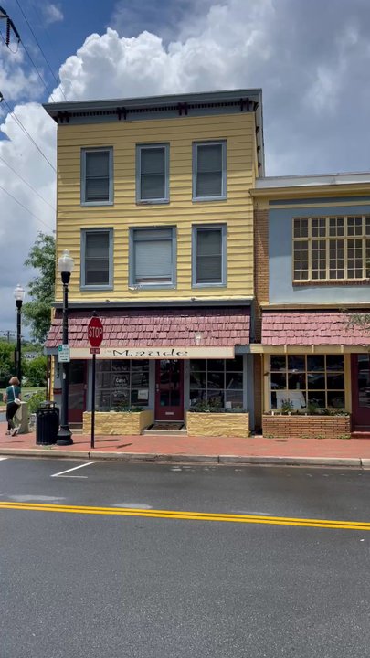 Maude - Salon is first shop in vid of Station Street shops in old town historic downtown Herndon square - opposite side from Good Harvest Bread - Hair Salons Near Me - Herndon, Virginia
