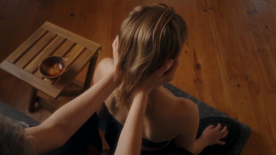 Zittende hoofdmassage