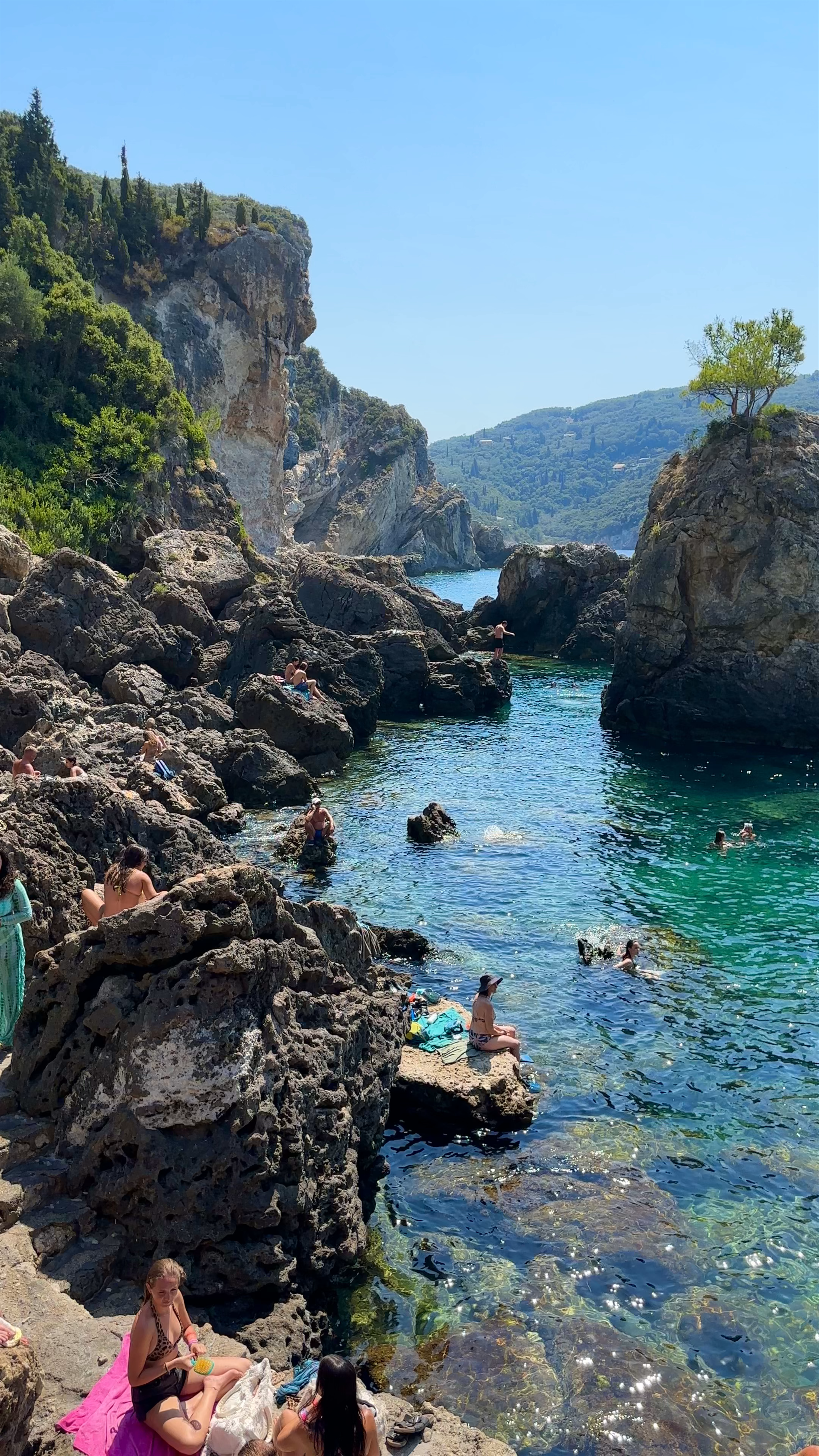 La Grotta Jetty: Cliff Diving and Crystal Waters in Palaiokastritsa, Greece