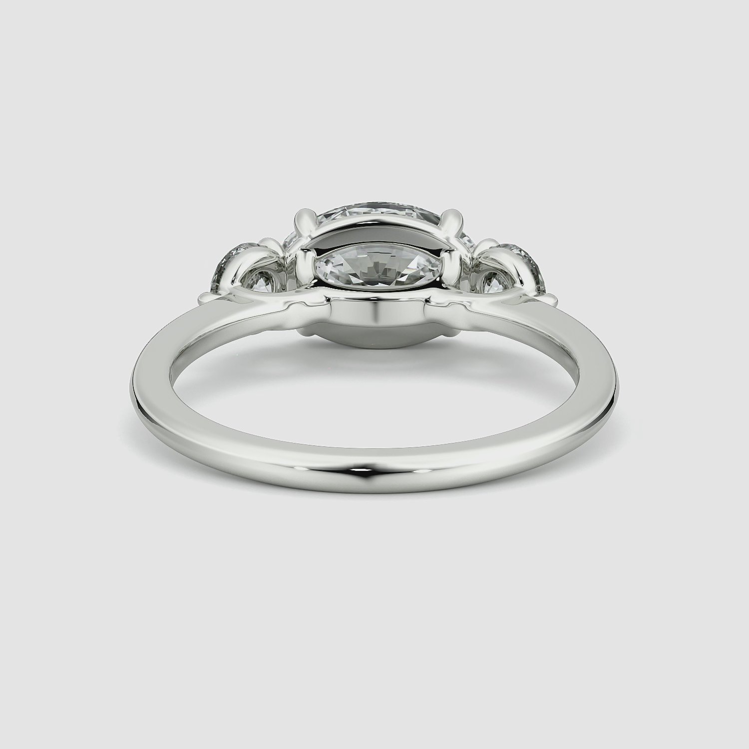 The Three Stone | Oval | Platinum | bandAccent: Plain | diamondOrientation: horizontal | sideStoneCarat: 0.25ct | sideStoneShape: Round Brilliant | caratWeight: other
