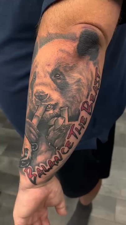 Archer Ink Tattoo - Forearm wrap, fierce lion and calm panda duality. Realism and graphic duality. - Tattoo Near Me - Lockport, Illinois