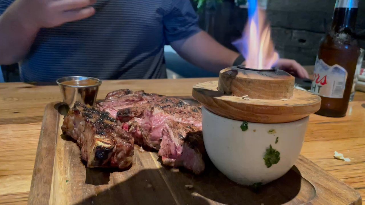 Whiskey Cake Alliance - 44 FARMS COWBOY RIBEYE  24oz bone-in ribeye, roasted marble potatoes, Mac & cheese, smoked chimichurri, house steak sauce - New American Near Me - Fort Worth, Texas