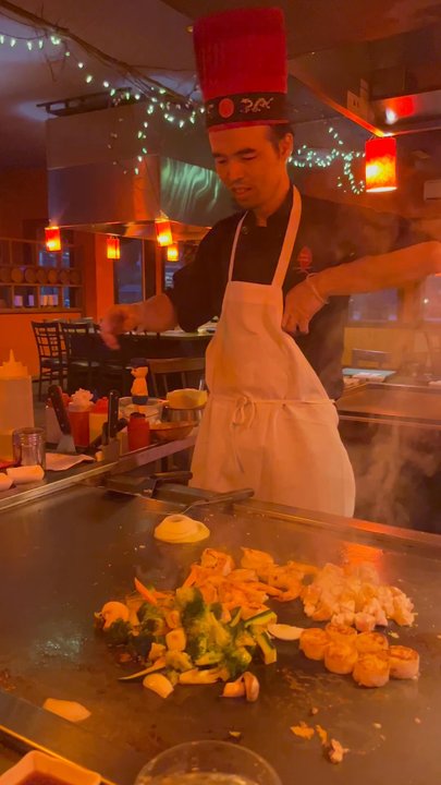 Feng Bistro - The Hibachi chef lights the onion volcano - Chinese Near Me - Lake George, New York