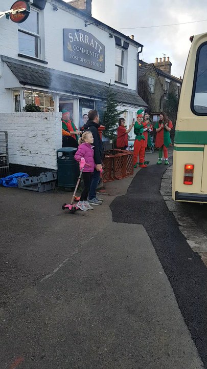 Sarrat Community Post Office - Grainger served chestnuts, mould wine & mince pies. local village children entered the bus to collect their presents from Father Christmas - Post Offices Near Me - Sarratt, HRT