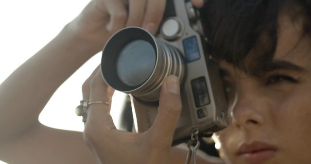 Woman taking photographs