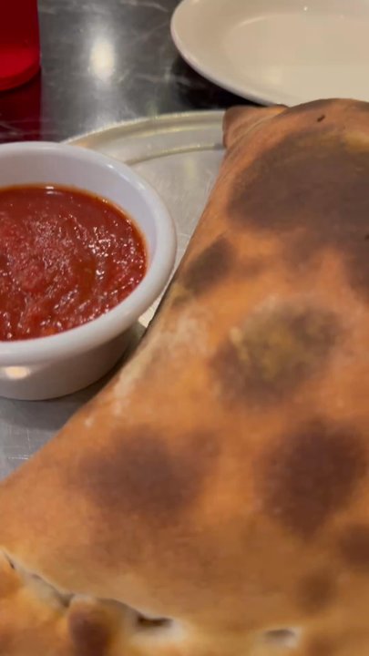 Napoli's Pizza & Restaurant - The calzone with "sliced sausage" well done marinara in the side. Might add some hot peppers next time, but absolutely fantastic! - Italian Near Me - Allen, Texas