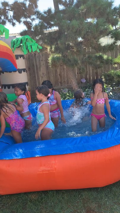Olivia's backyard playhouse - There was a line to go onto the slide! - Party Supplies Near Me