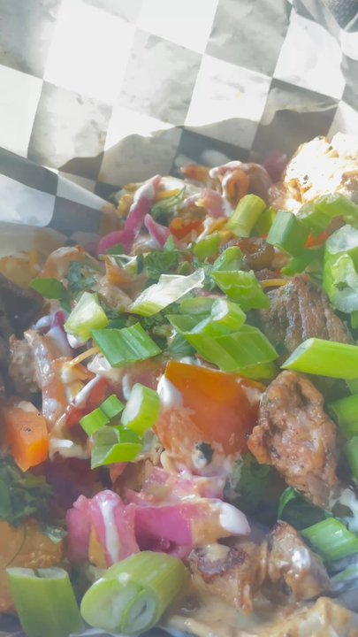 Front Yard Tacos - Usually the egg is placed on top but this time it was scrambled throughout. The steak was cold, the tots were cold, as well as the eggs. - Food Trucks Near Me - Mobile, Alabama
