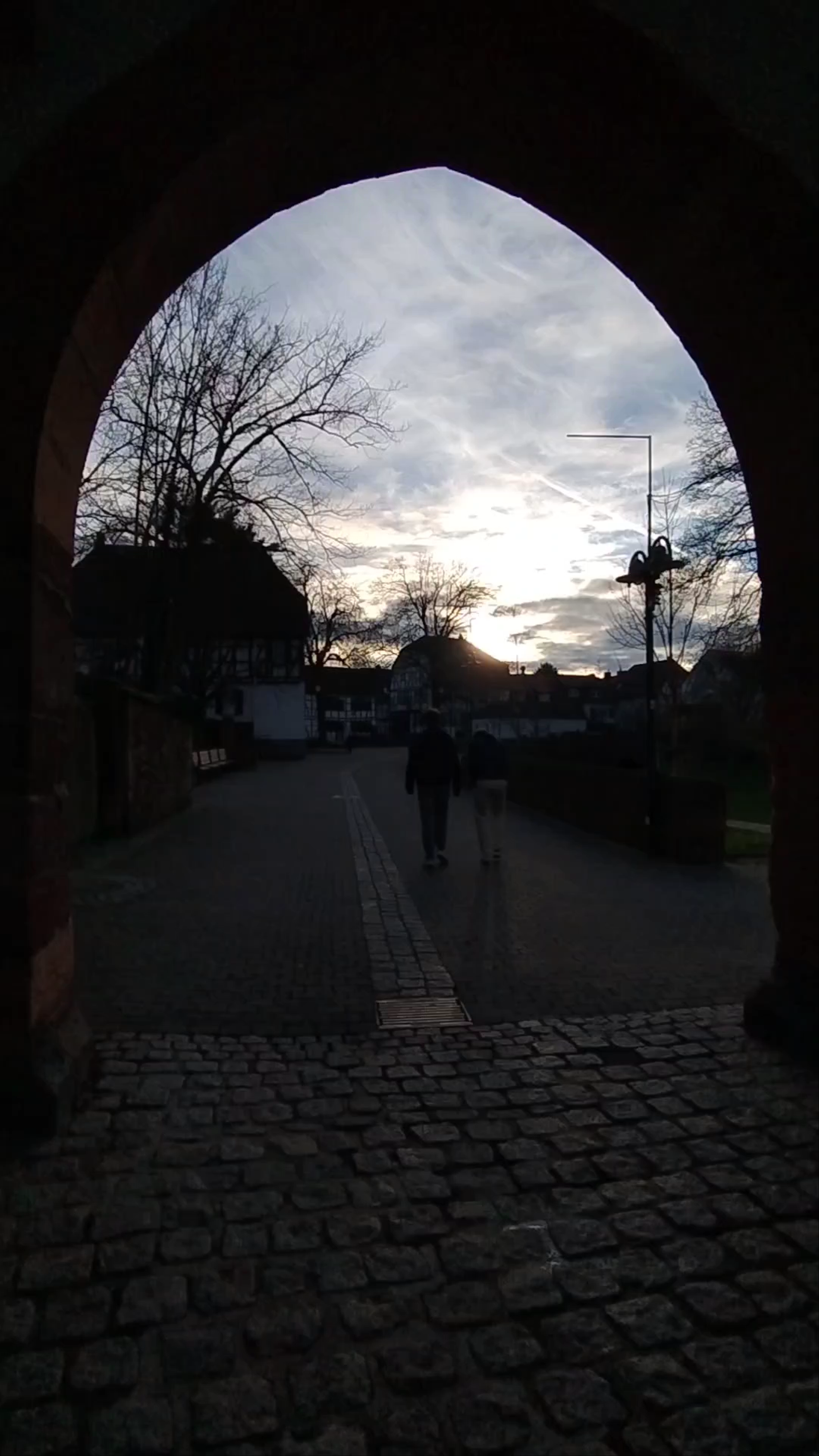 Twilight Walk Through Untertor Archway in Dreieich, Germany