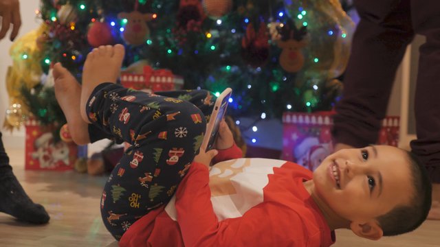 Boy in Christmas pyjamas