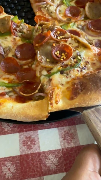 Bella Nonna - Look at that cheesiness! So hot you can see the heat - Italian Near Me - Tavares, Florida
