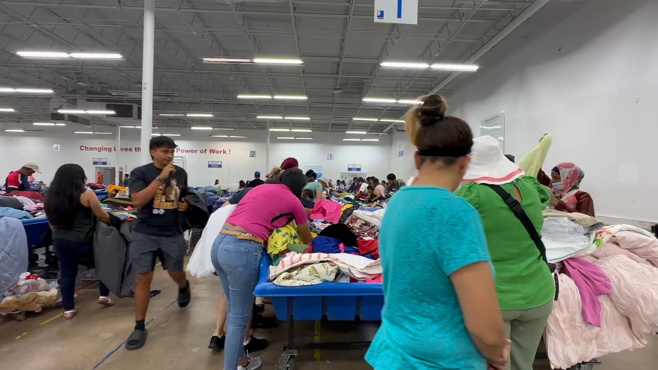 Goodwill Outlet Store - What happens after a row of bins has been restocked with more clothing, books, etc. - Thrift Stores Near Me - Houston, Texas