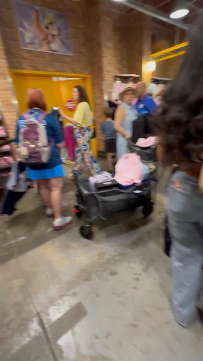 Disney's Character Warehouse - Conducting auctions of items she hasn't purchased right in front of staff and the entrance to the supply room. - Outlet Stores Near Me - Orlando, Florida