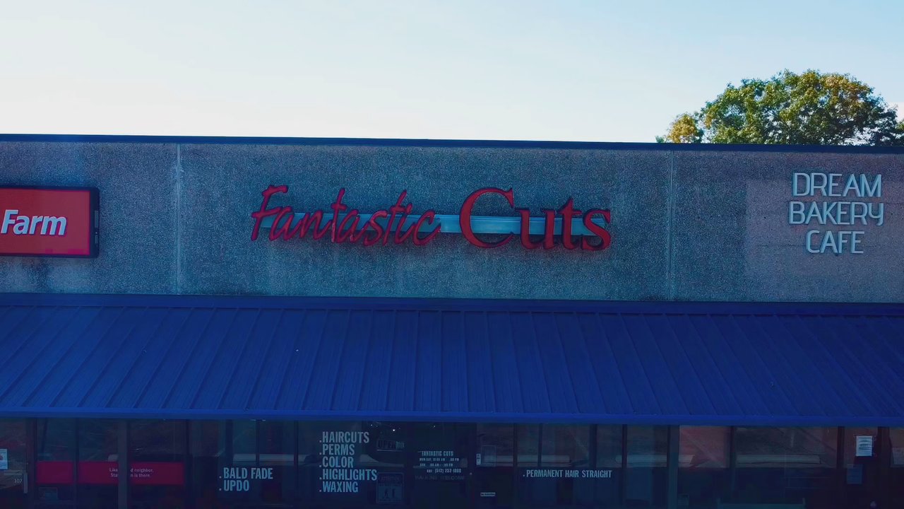 Fantastic Cuts - Quick Dronie of storefront - Hair Salons Near Me - Austin, Texas